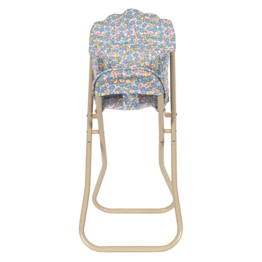 The Konges Slojd Doll High Chair is a beige, foldable chair for dolls with a detachable seat and backrest in blue floral fabric, shown from the front.