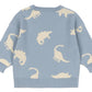 The Konges Slojd Baby Boys' and Boys' Lapis Knit Sweater features white dinosaur silhouettes on light blue, broad rib hems and neckline, and a relaxed fit for comfort and style.