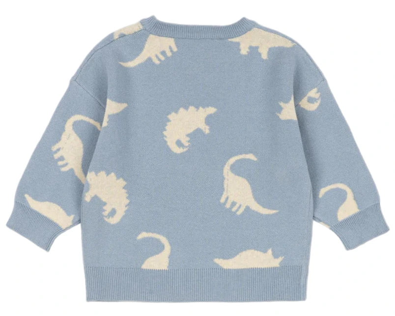 The Konges Slojd Baby Boys' and Boys' Lapis Knit Sweater features white dinosaur silhouettes on light blue, broad rib hems and neckline, and a relaxed fit for comfort and style.
