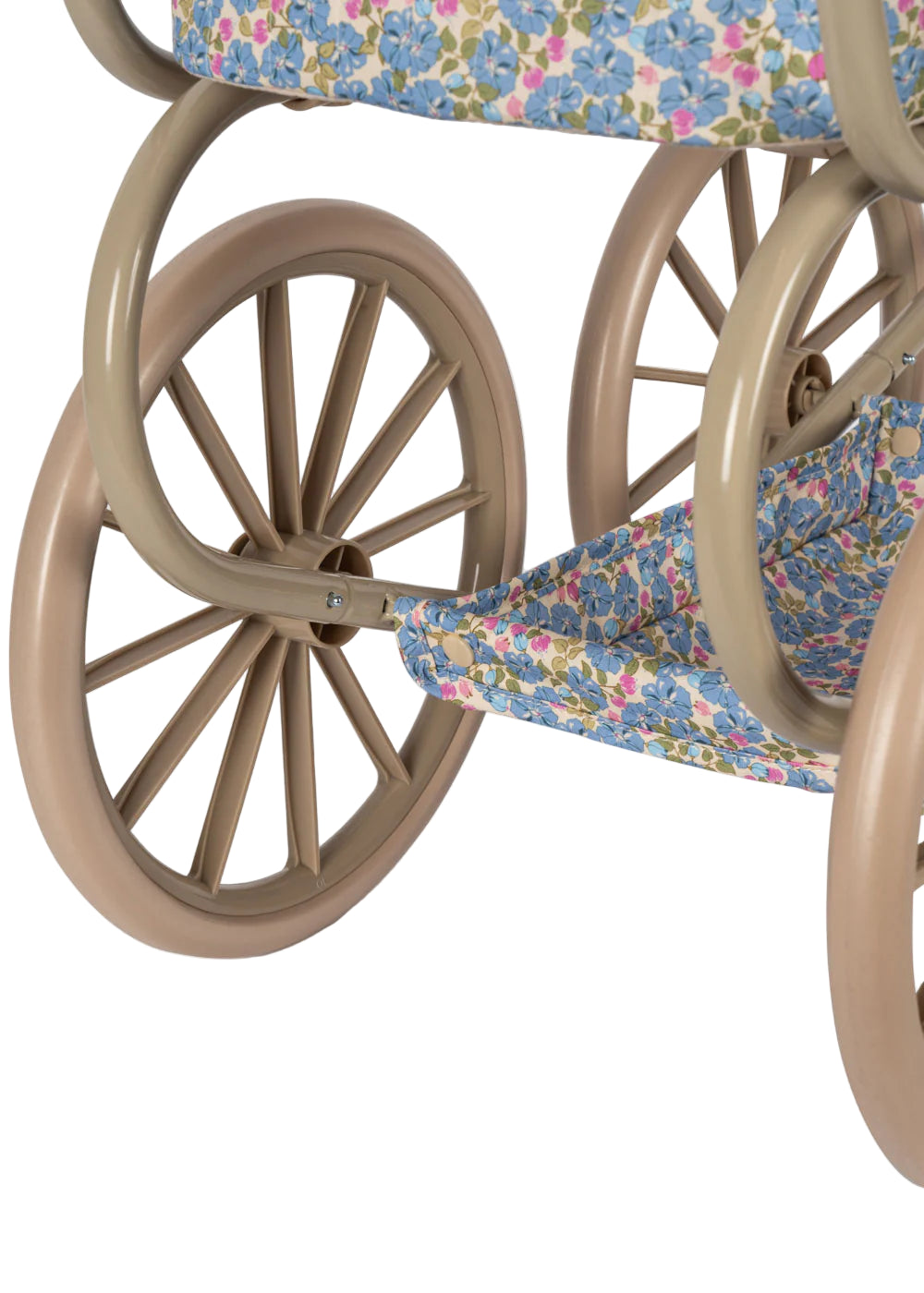 Close-up of the Minnie Doll Pram by Konges Slojd, a foldable vintage-style doll stroller with beige wheels and blue, purple, and yellow floral fabric.