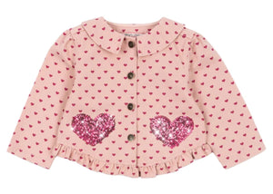 The Konges Slojd Baby Girls' and Girls' Nola Sequin Shirt Jacket features pink cotton twill, a small heart pattern, sequin heart patches on the front, button closure, and cute frill hems.