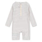 The Konges Slojd Baby Boys’ Aster Onesie Swimsuit is a long-sleeve romper featuring thin horizontal stripes and a front zipper closure, designed as a swim onesie with built-in UV protection, shown on a white background.