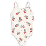 The Konges Slojd Baby Girls’ and Girls’ Frago Swimsuit is a cream-colored one-piece featuring thin straps, playful cherry and blueberry prints, and charming blue polka dots. This comfortable, stretchy swimsuit is perfect for active days by the water.