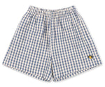 Baby boys’ and boys’ Kim Short by Konges Slojd, featuring a blue and white checkered design, crafted from breathable organic cotton with an elastic waistband and a small yellow embroidered detail on the lower right leg, laid flat on a white background.