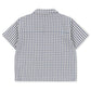 Konges Slojd Baby Boys’ and Boys’ Kim Short Sleeve Shirt, featuring a blue and white plaid seersucker design, is shown from the back against a plain white background.