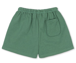 Baby boys’ and boys’ Spotty Sweat Short by Konges Slojd, featuring an elastic waistband and a single patch pocket on the back, laid flat on a white background.