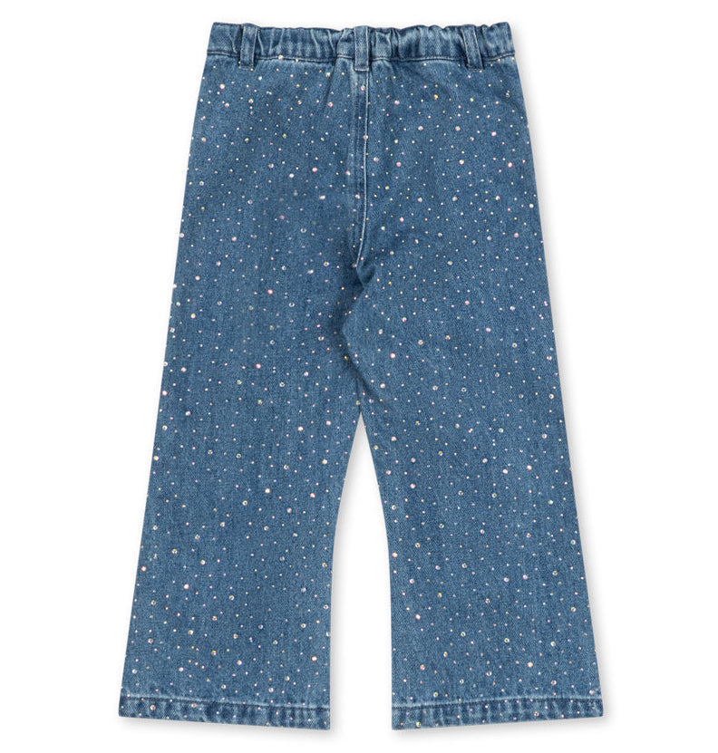 Konges Slojd Girls’ Elba Sparkle Jeans in blue organic denim featuring a flared leg, an elastic waistband, and an all-over pattern of small, multicolored rhinestones.