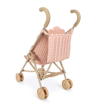 Konges Slojd Poppy Doll Stroller Set featuring a pink and white gingham seat and a beige frame.
