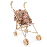 Konges Slojd Sparkly Doll Stroller with four double wheels, washable removable pink sequin seat, and cherry embroidery.
