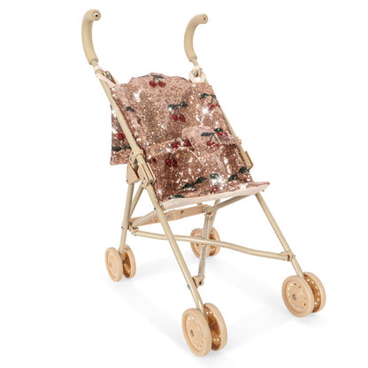Konges Slojd Sparkly Doll Stroller with four double wheels, washable removable pink sequin seat, and cherry embroidery.