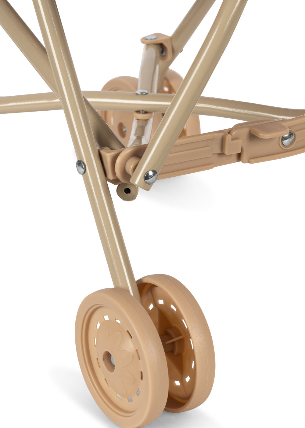 Close-up of the lower frame and wheels of the Sparkly Doll Stroller by Konges Slojd, showing intersecting metal bars and two plastic wheels on a white background.