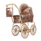 Konges Slojd Sparkly Minnie Doll Pram in rose-gold sequins with a cherry pattern, tan frame, and matching hanging bag.