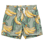 Pink Chicken Boys' Swim Trunks with elastic waistband and drawstring, featuring a fun yellow banana and green leaf pattern.