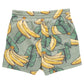 The Pink Chicken Baby Boys' Swim Trunk features a playful banana and green leaf pattern, an elastic waist, and a convenient back pocket—ideal for beach vacations.