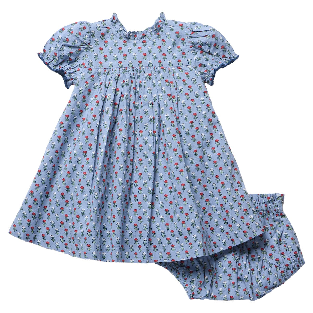 Pink Chicken Baby Girls’ Lucia Dress Set in light blue, featuring short puff sleeves and a delicate floral print, adorned with exquisite diamond smocking that highlights heritage craftsmanship. The set includes matching bloomers and is displayed on a white background.