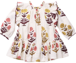 The Girls’ Harper Dress by Pink Chicken features a white long-sleeve design with a ruffled hem and Harvest Dandelion floral print in yellow, pink, and brown.