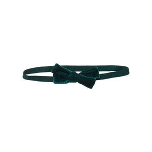 Pink Chicken Baby Girls’ Bow Headband in dark green velour with a small holiday bow.