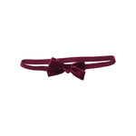 Deep red elastic Pink Chicken Baby Girls’ Bow Headband featuring a small bow.