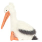 The Jellycat Keli Pelican plush toy features soft white fur, grey wings, and orange beak and feet. Inspired by Keli Pelican from "The Beak" talk show, it sits upright against a white background.