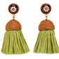 The Lizzie Fortunato Raffia Earrings boast gold-plated, round multicolored studs and brown woven tops complemented by light green tassels, ideal for a jet-setter with summer flair.