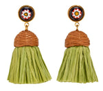 Introducing the Lizzie Fortunato Raffia Earrings by Lizzie Fortunato—a perfect accessory for the jet-setter personality. These earrings feature woven straw tops, green fringes, and round colorful studs at the top.