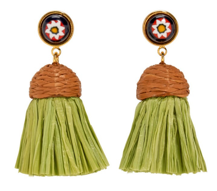 Introducing the Lizzie Fortunato Raffia Earrings by Lizzie Fortunato—a perfect accessory for the jet-setter personality. These earrings feature woven straw tops, green fringes, and round colorful studs at the top.