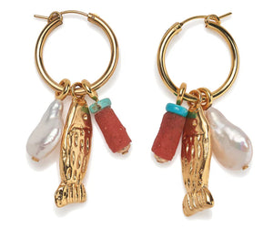 The Minnow Hoop Earrings by Lizzie Fortunato are gold-plated sterling silver hoops with three charms: a gold fish, a vintage red and blue glass bead, and an irregular white pearl-like bead.