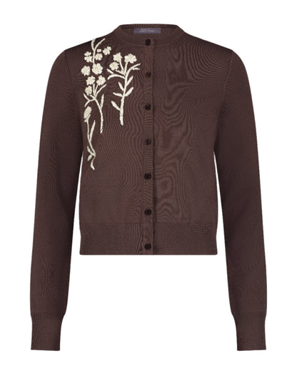 The Lela Rose Raffia Embroidered Knit Long Sleeve Cardigan features front buttons and white floral embroidery on soft brown knit.