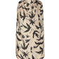 A sleeveless beige cape with a black bird and chain pattern, shown from the back, layered over the Altuzarra Sleary Top for effortless sophistication.