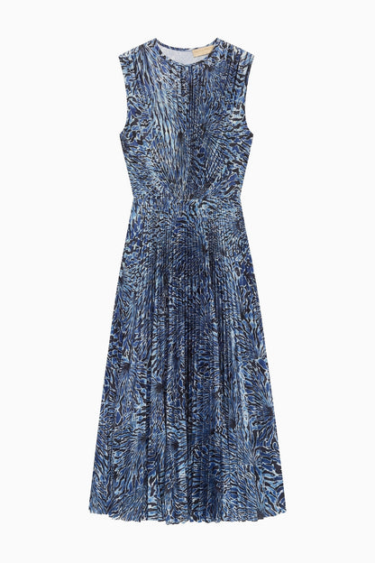 The Ulla Johnson Malin Satin Dress is a sleeveless, knee-length midi with a blue and black abstract pattern and a pleated skirt, shown on a white background.