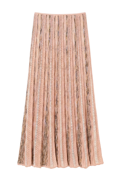 The Clio Knit Midi Skirt by Ulla Johnson is a pleated pink skirt with vertical lace and patterned panels, featuring an elastic waist for comfort.