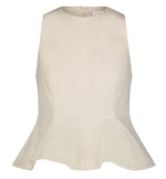The Lela Rose Stretch Cotton Halter Top features a tailored fit in off-white, with subtle seam detailing and a flared hem for an elegant silhouette.