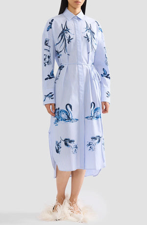 Erdem Stripe Poplin Long Sleeve Midi Shirt Dress in blue and white stripes with blue swan and floral tattoo-inspired motifs and a tie waist.
