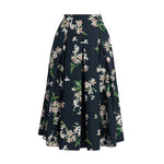 The Erdem Floral Cotton Midi Pleated Skirt is crafted from navy cotton poplin, featuring an all-over white and pink floral print and a pleated midi-length design.
