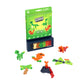 The Plus Plus Puzzle By Number® Activity Pad features a green box, colorful puzzle pieces, and completed pixel-style dinosaurs and a volcano displayed at the front. This engaging kit sparks creativity and helps children develop fine motor skills as they assemble their very own prehistoric scenes.