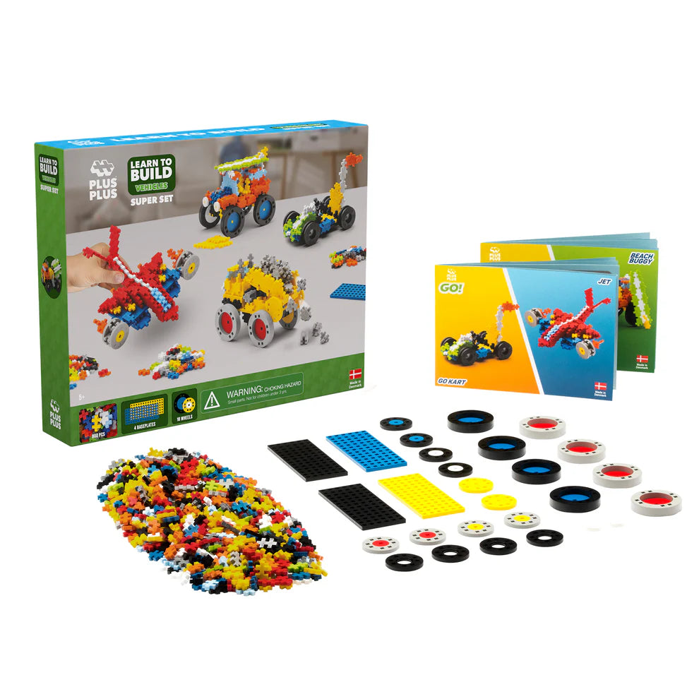 The Plus Plus GO! Learn To Build Vehicles - Super Set includes an instruction booklet, plastic building pieces, wheels, and plates on a white surface—ideal for creative, hands-on STEM play.