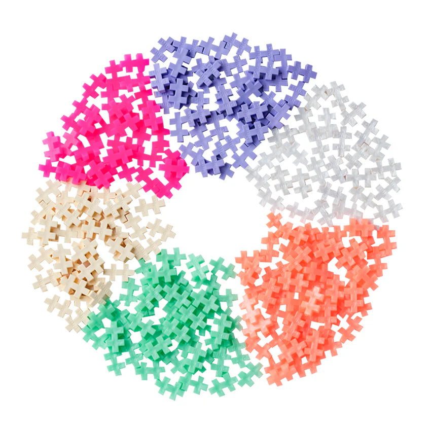 The Plus Plus Tube - 240 Piece - Pearl Mix features small interlocking pieces in pink, purple, white, orange, green, and beige on a white background—ideal for creative STEM play and building fine motor skills.