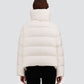 Back view of a white, eco-friendly water-repellent Herno Cashmere Silk Jacket, a cropped puffer with an oversized collar, worn over black trousers.