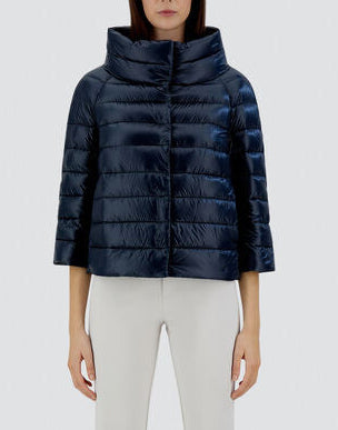 Navy blue Herno Sofia Ultralight Nylon Cape in a quilted design with a high collar and bejewelled three-quarter length sleeves.
