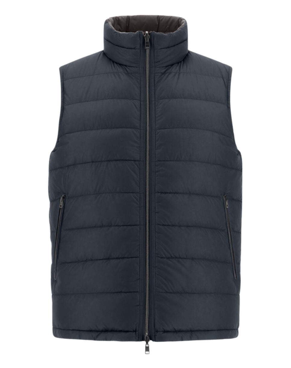 Herno Men's Nylon Ultralight Reversible Vest is a dark grey, quilted puffer vest with a high collar and front zipper, featuring two side zip pockets and filled with premium goose down feathers.