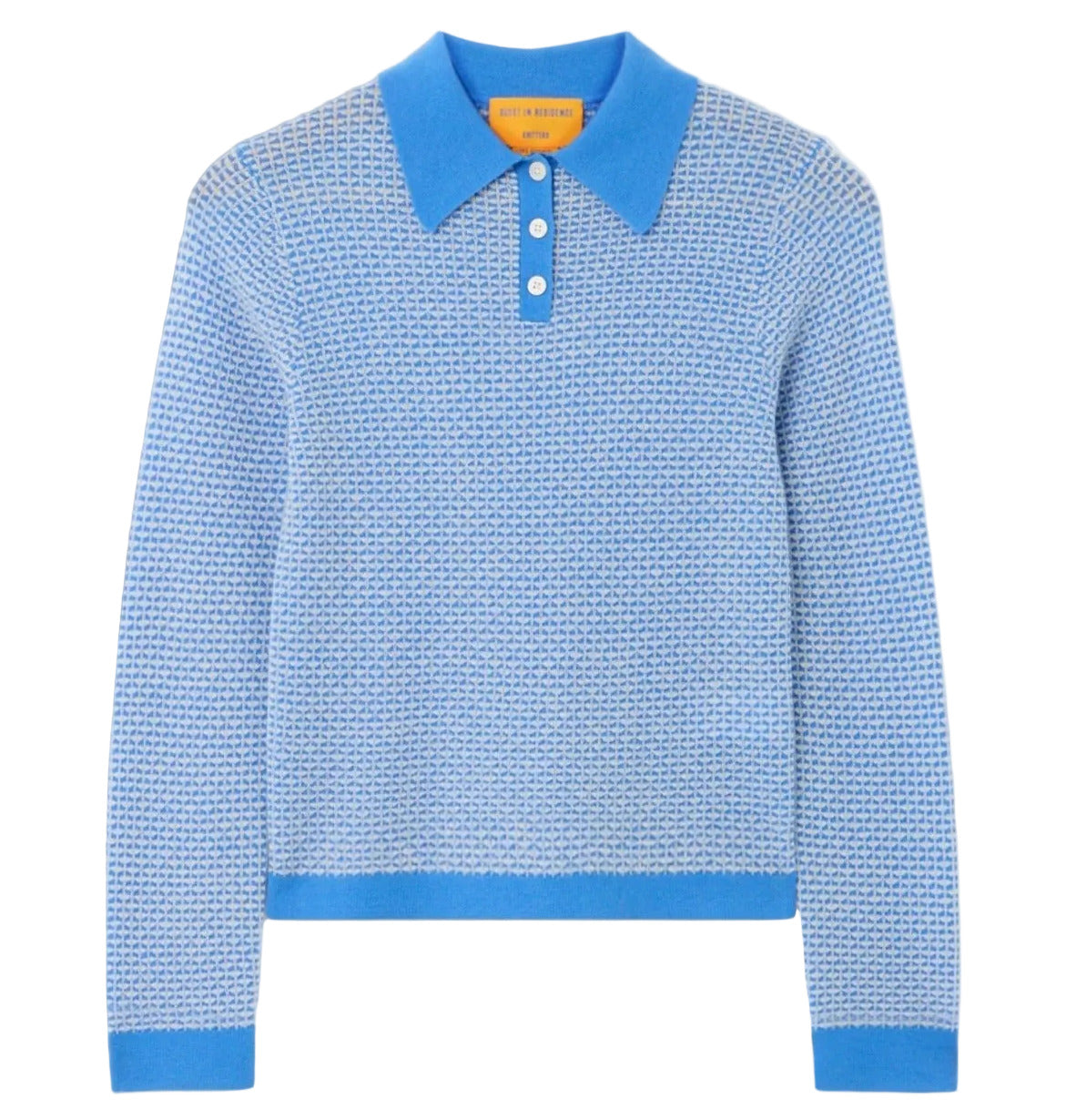 The Guest in Residence Pique LS Shrunken Polo is a light blue women’s long-sleeve sweater featuring a textured pique stitch, blue collar, cuffs, waistband, and a classic three-button placket for timeless style.