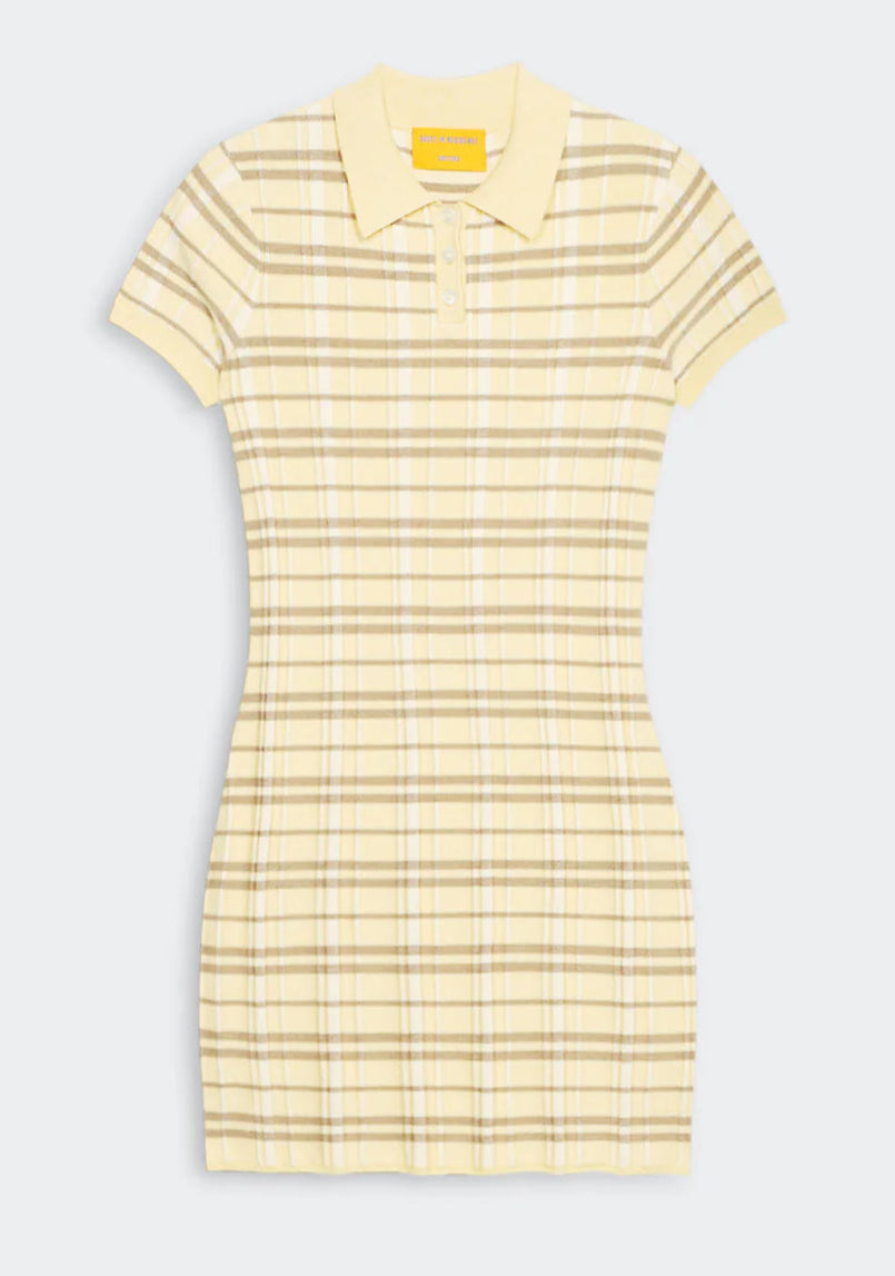 The Plaid Polo Dress by Guest in Residence features short sleeves, a collared neckline, and a buttoned placket, crafted from yellow and beige plaid silk linen blend.