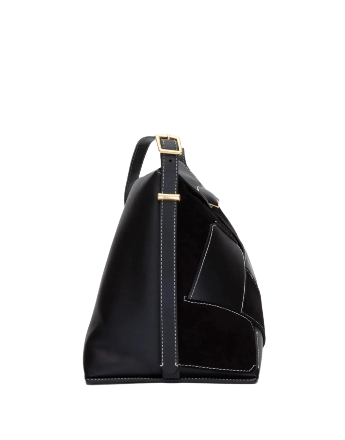 Side view of the 3.1 Phillip Lim ID Soft Shoulder Bag Woven Combo, crafted in black leather with a gold buckle and white stitching details, featuring an adjustable shoulder strap.