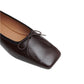 Close-up of the Mansur Gavriel Square Toe Ballerina in dark brown lambskin, featuring a small bow on the toe, displayed against a white background.