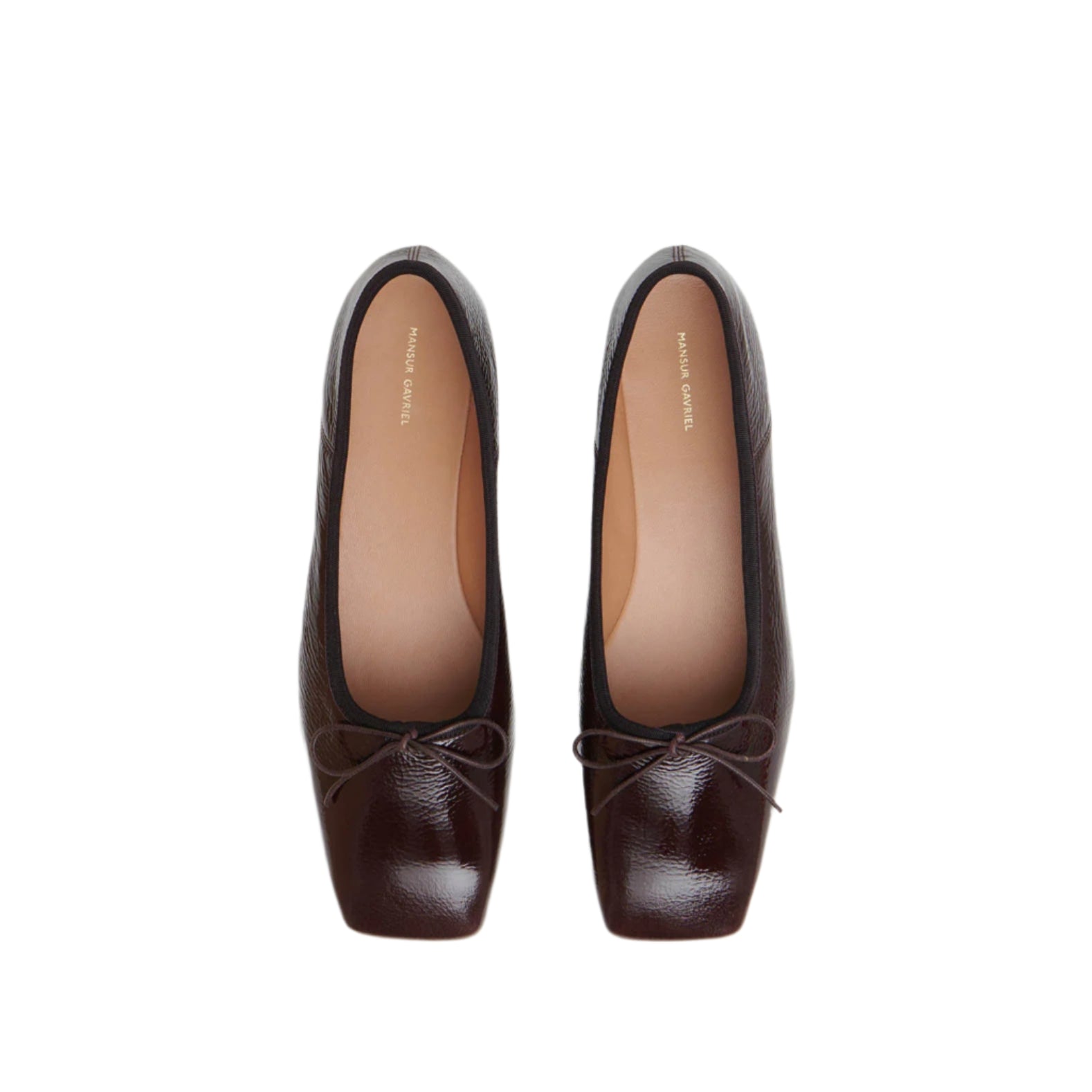The Mansur Gavriel Square Toe Ballerina in dark brown lambskin features small front bows and a square toe, shown from above on a white background—an elegant choice for timeless style.