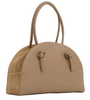 The Fortuna Bowling Bag by Mansur Gavriel is a tan top-handle bag in Italian leather, offering a spacious interior and sturdy handle for effortless style.