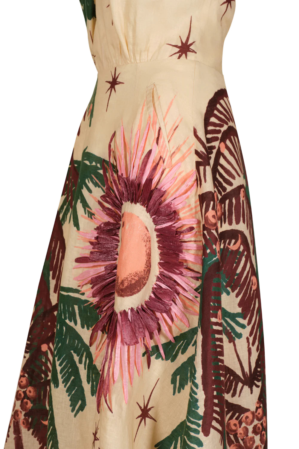 Close-up of the Johanna Ortiz Western Elements Ankle Dress, a cream-colored linen piece with abstract pink, purple, and peach botanical embroidery accented by green leaves and brown star patterns.