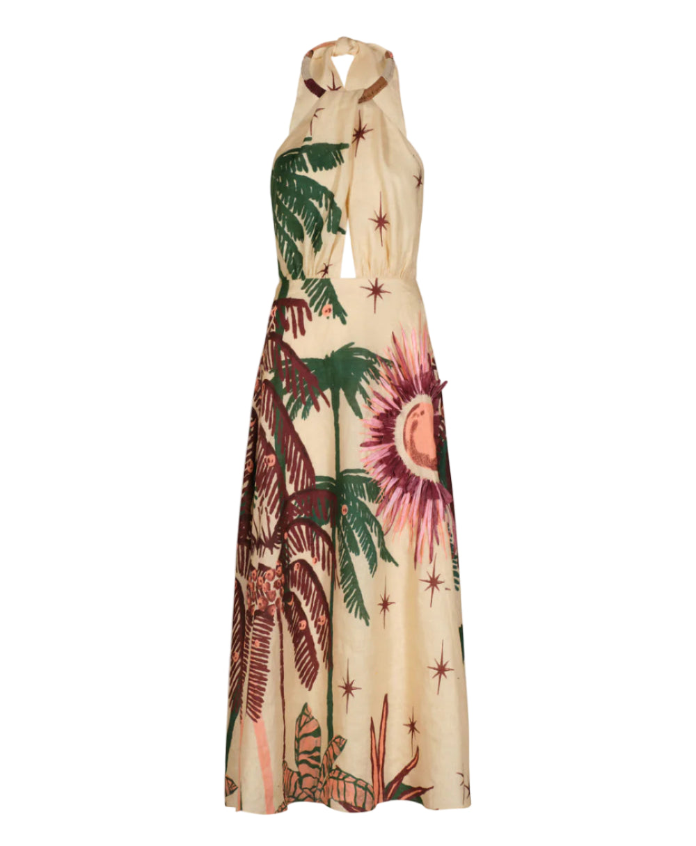 The Western Elements Ankle Dress by Johanna Ortiz is a sleeveless halter-neck design in beige, adorned with tropical botanical motifs—palm trees, stars, and a sunburst in green, brown, and purple tones.