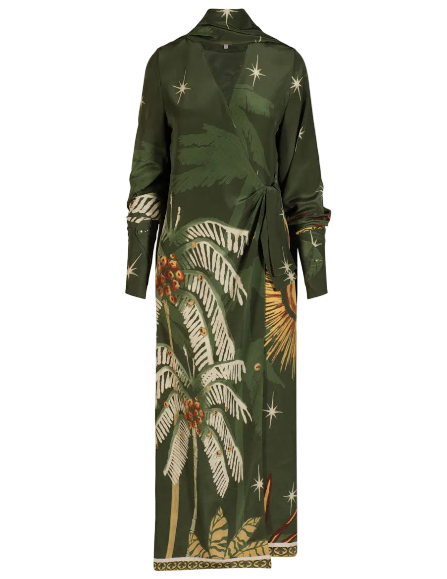 The Eternity Begins Wrap Dress by Johanna Ortiz is a long-sleeved, dark green silk crêpe de chine wrap dress with a tropical palm tree and star JO print, waist tie, and decorative hem border.