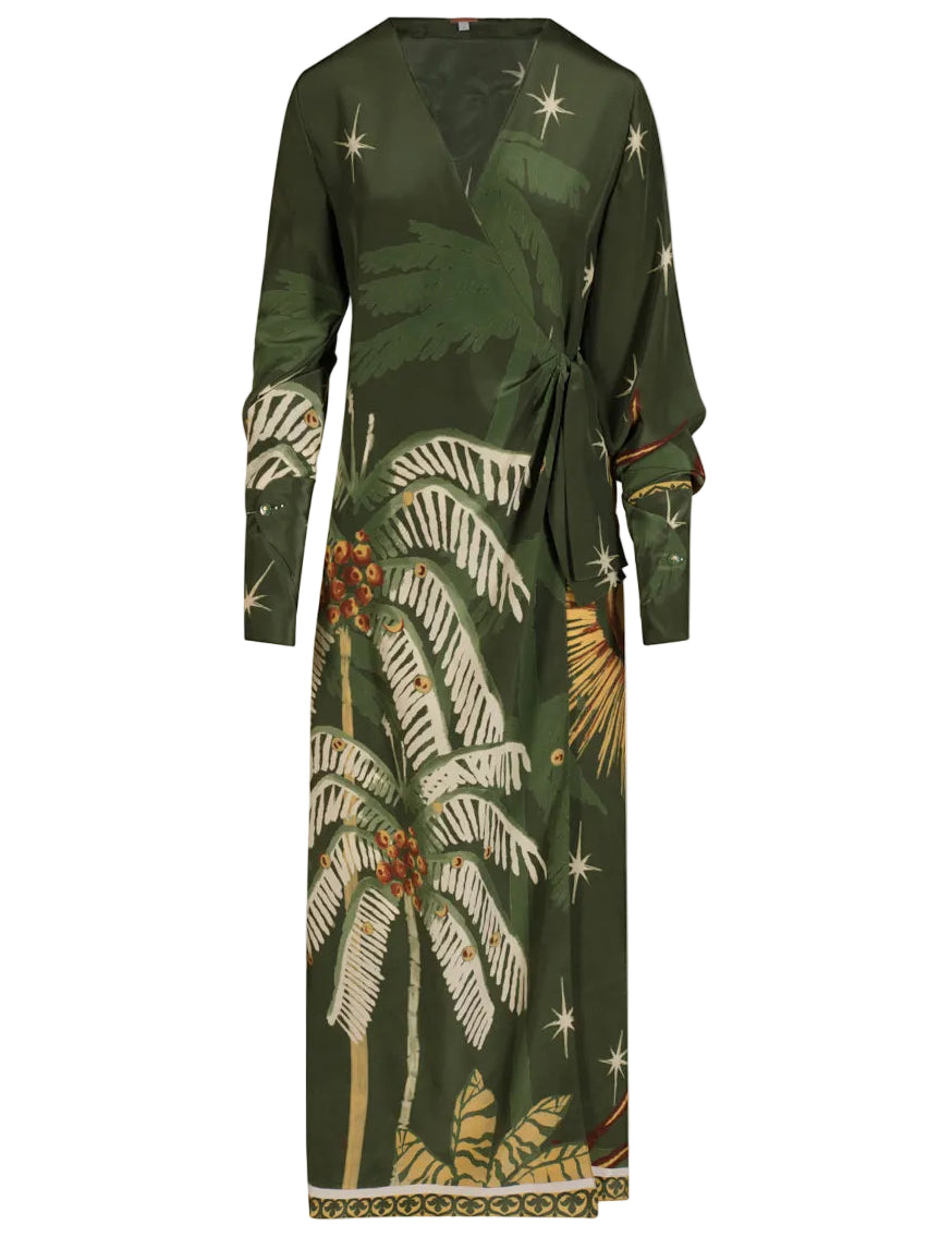 The Johanna Ortiz Eternity Begins Wrap Dress is a dark green silk crêpe de chine wrap dress with long sleeves, a JO tropical palm tree and star print, and a tie waist detail.